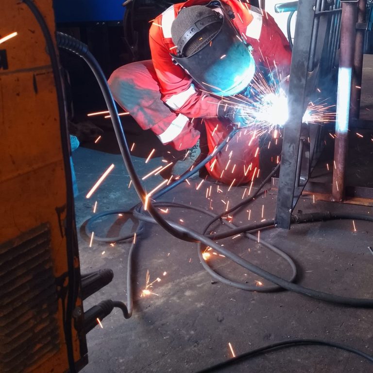 MIG welding railing in our workshop in Silloth